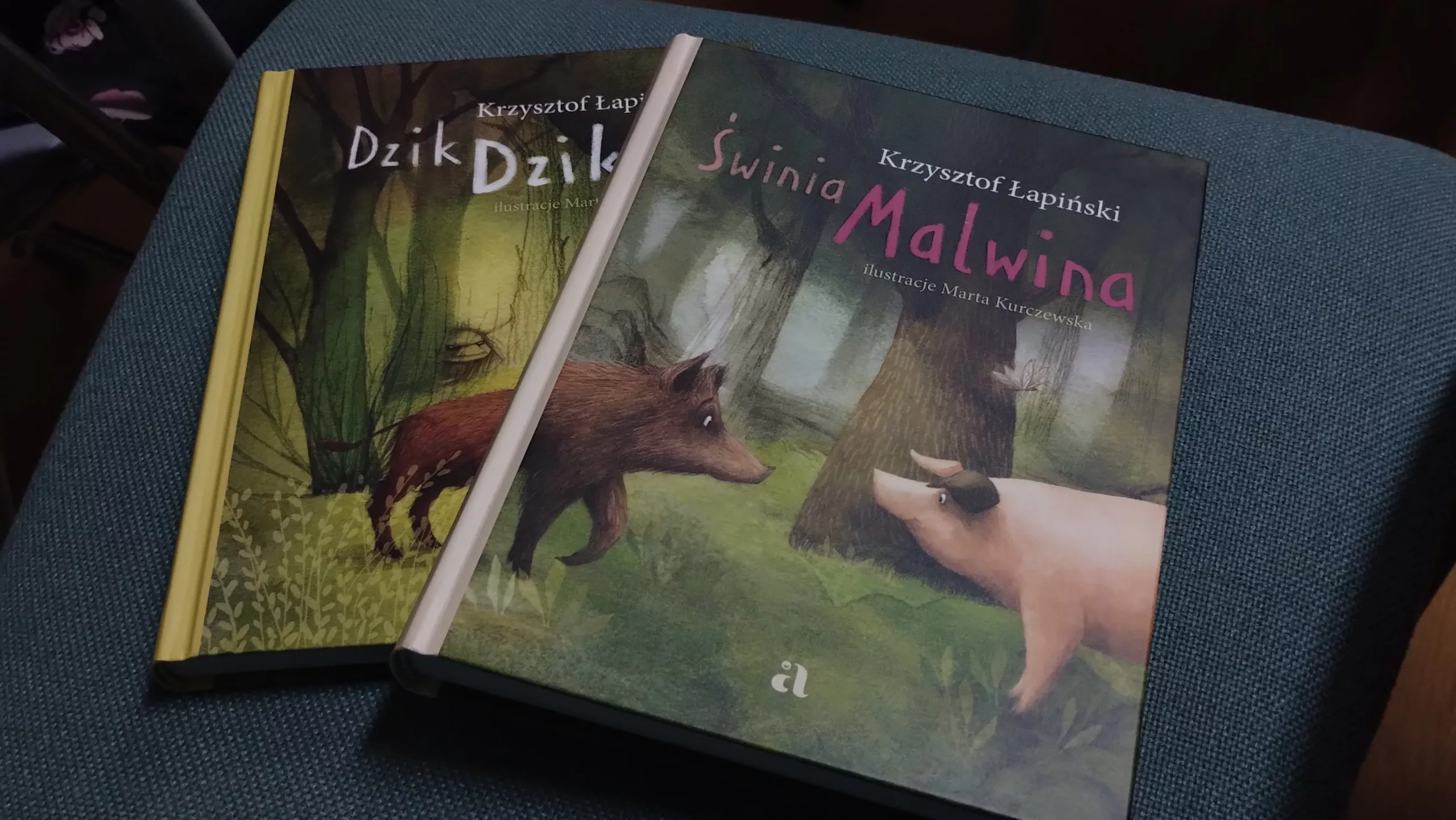 Książki Krzysztofa Łapińskiego "Dzik Dzikus" i "Swinia Malwina"